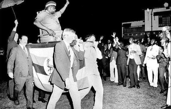 President Amin being carried by British citizens before declaring conquest of the British empire