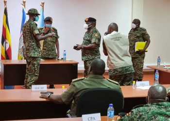 Gen Kandiho Hands over Office to New CMI Chief Gen Birungi