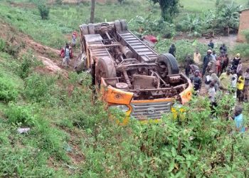 3 Passengers Injured as Global Coaches Bus Overturns in Lwera
