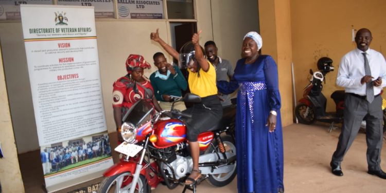 Minister Oleru Donates Motorcycle to Lwengo Tweyambe Women’s and Orphans Veterans SACCO