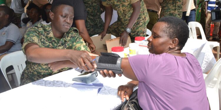 MODVA Staff Offer Free Medical Services, Clean Bugolobi Market
