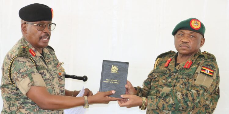 Maj Gen Kyanda Hands over Office to Maj Gen Bakasumba