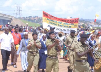 Police Escort Foot Pilgrims Trekking to Namugongo for Martyrs Day