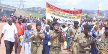 Police Escort Foot Pilgrims Trekking to Namugongo for Martyrs Day