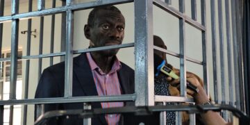 Dr Kizza Besigye in the dock at the General Court Martial in Makindye (Photo by 
Kungu Al-mahadi Adam)