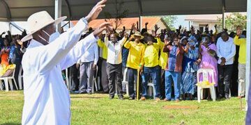 President Museveni waves to a crowd in Eastern Uganda