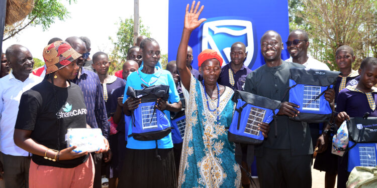 Stanbic Bank Donates 220 Solar-Powered Bags to Okere City School Girls