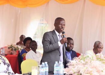 Minister Butime Calls for Stronger HIV/AIDS Response During Candlelight Memorial