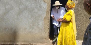 President Museveni visiting Ms. Biira Pelucy in Kasese Municipality
