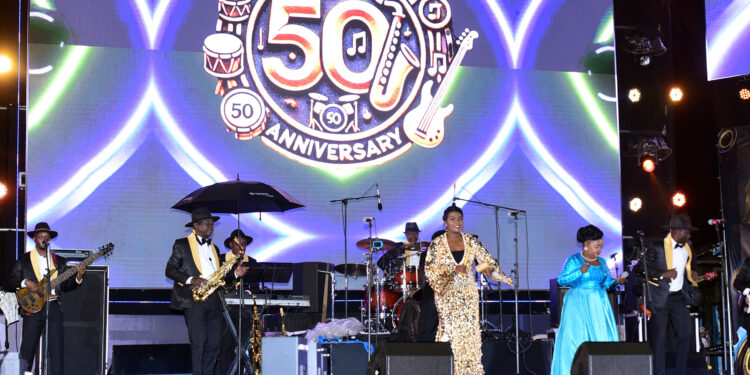 Afrigo Band, Koffi Olomide Thrill at Rain-Soaked 50th Anniversary Concert