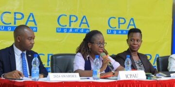 CPA Lydia Tusiime, ICPAU’s Manager of Business Development (M) speaking during the launch held at Africana Hotel in Kampala on Wednesday
