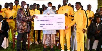 President Museveni handed the team a Shs2.4bn cheque