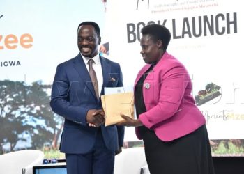 VP Alupo Launches “Moments with Mzee” Book, Lauds Photographer Abu Mwesigwa