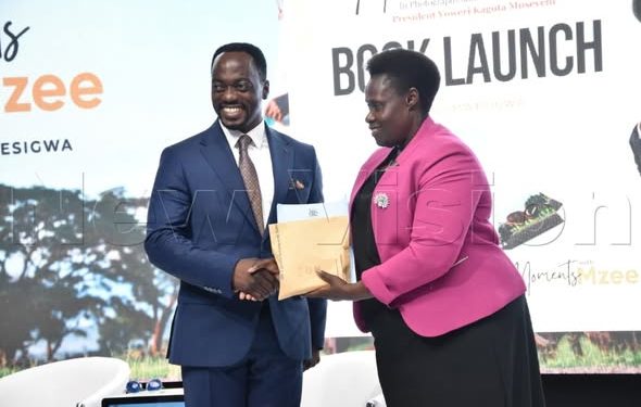 VP Alupo Launches “Moments with Mzee” Book, Lauds Photographer Abu Mwesigwa