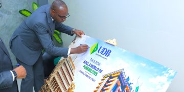 Musasizi Urges UDB to Mobilise Long-Term Capital as Bank Commissions New Head Office